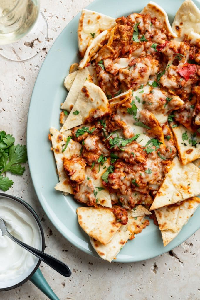 Butter chicken nacho’s met naan - Food from ClaudNine