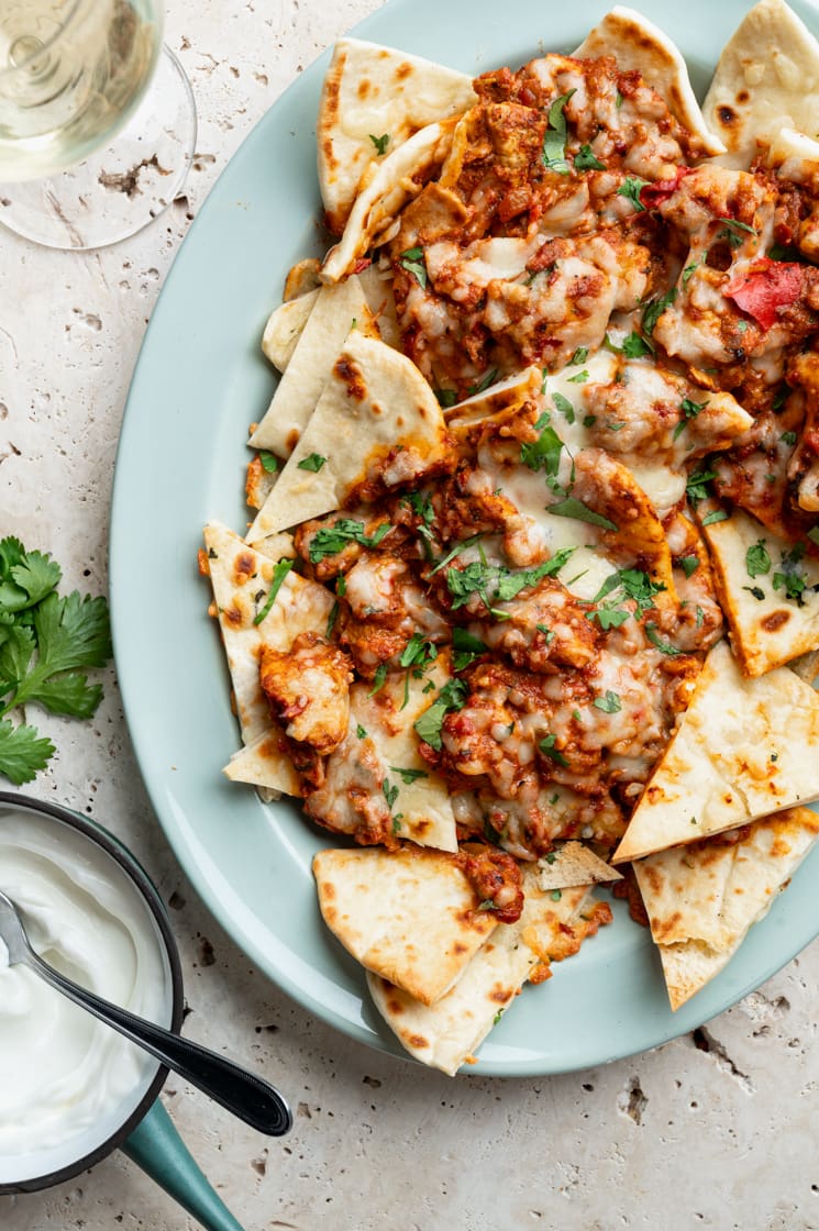 Butter chicken nacho’s met naan - Food from ClaudNine